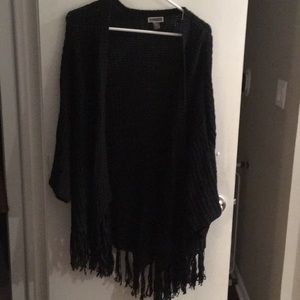 Black dolman sleeved open front cardigan.